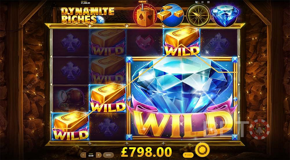 De goudstaaf wilds en expanderende wilds kunnen reguliere symbolen vervangen om je enorme winsten te geven in Dynamite Riches